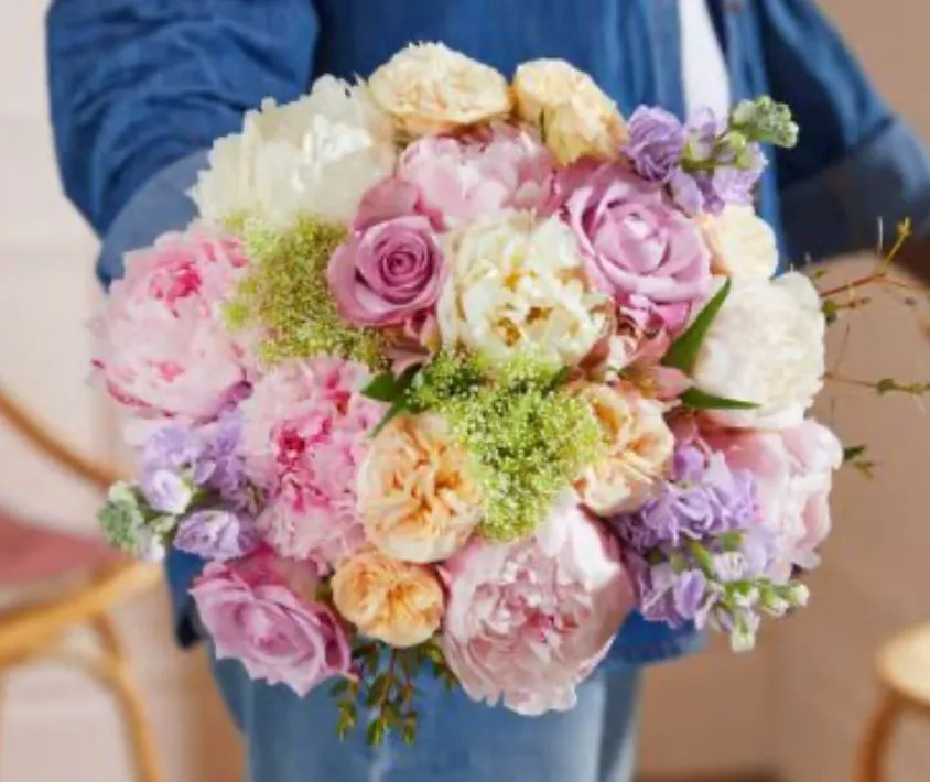 A hand-tied bouquet by Blooming Marvellous