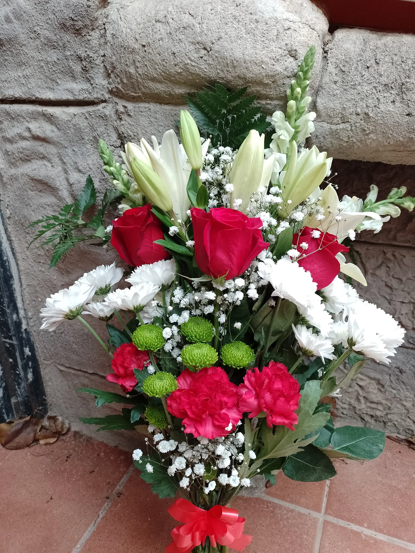 A hand-tied bouquet by Blooming Marvellous