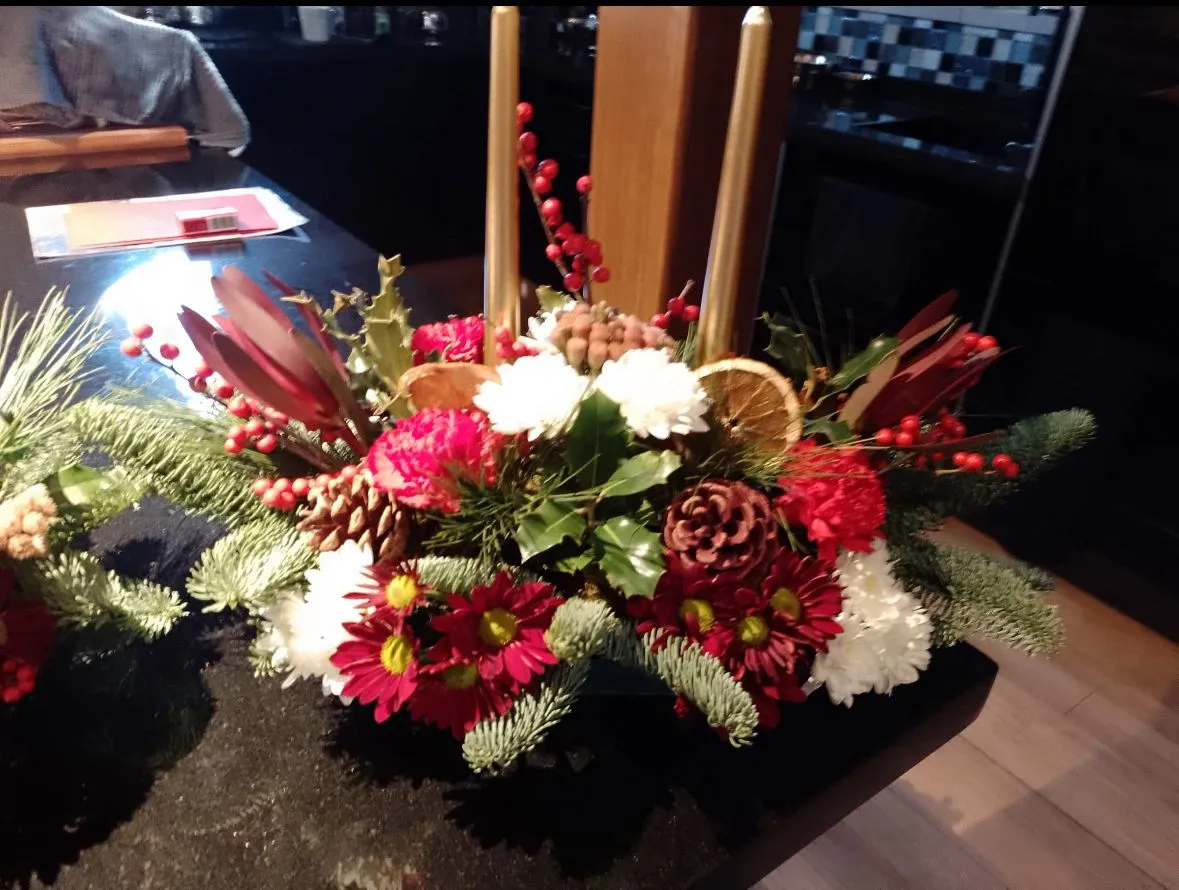 A seasonal Christmas arrangement by Blooming Marvellous