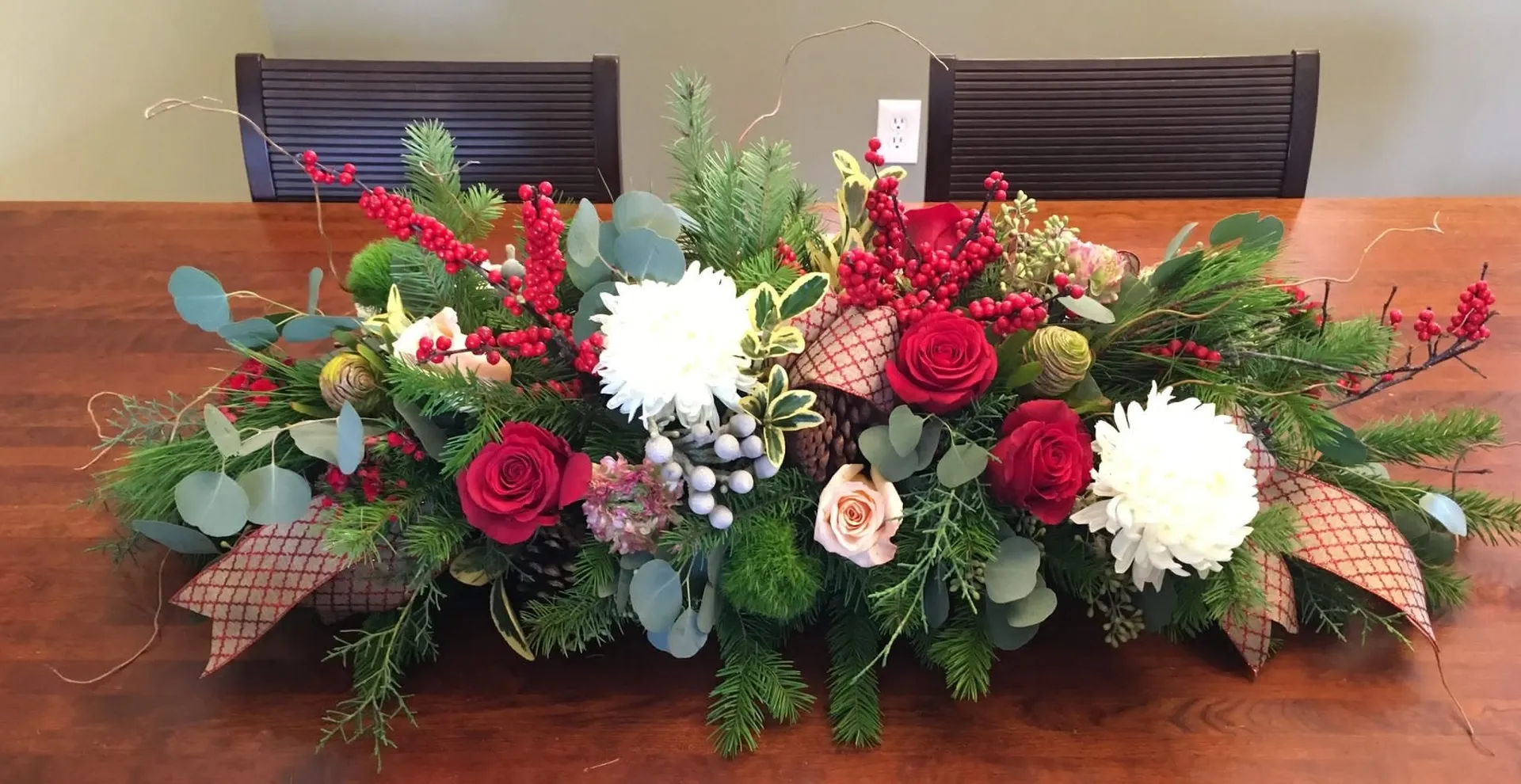 A seasonal Christmas arrangement by Blooming Marvellous