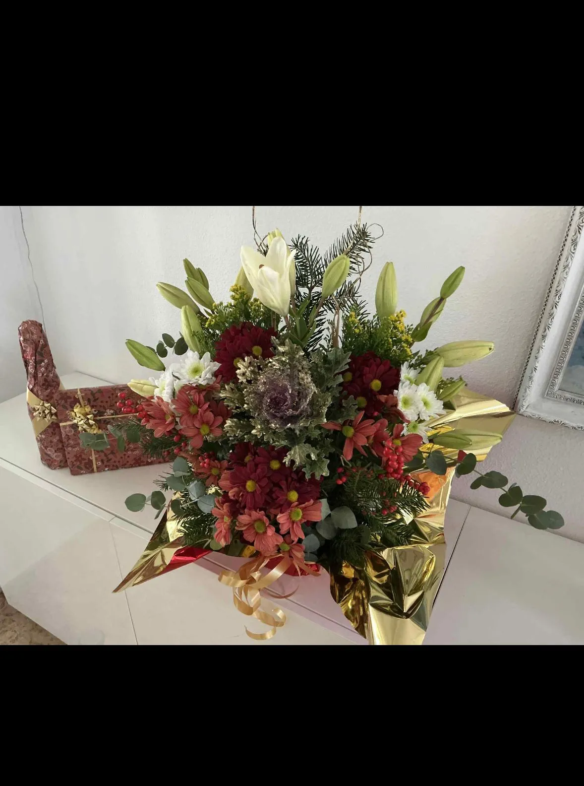 A seasonal Christmas arrangement by Blooming Marvellous