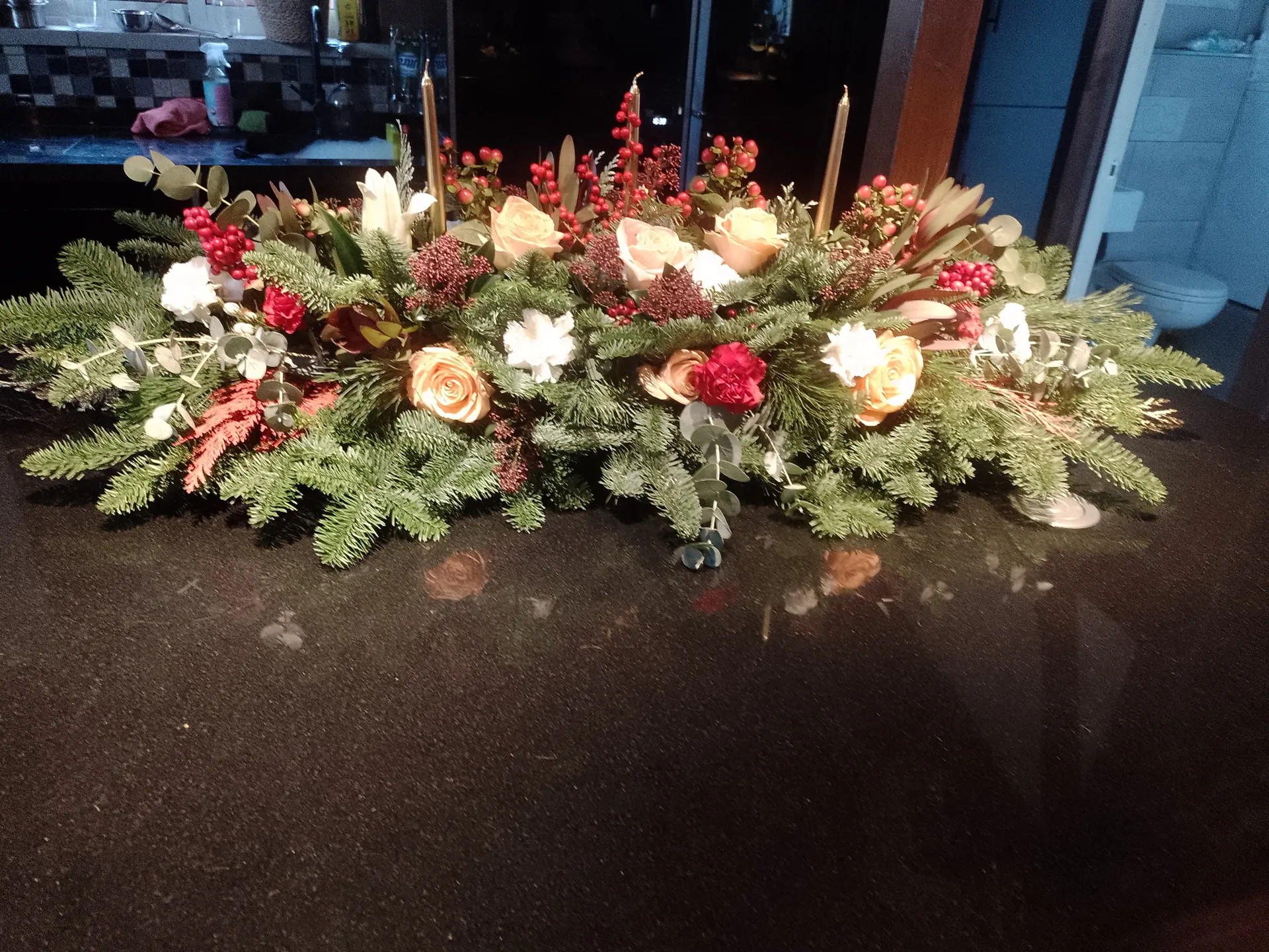 A seasonal Christmas arrangement by Blooming Marvellous